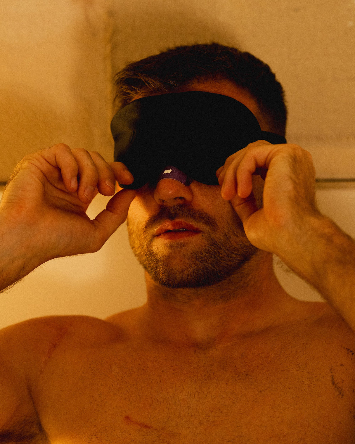 Ben White putting on an eye mask