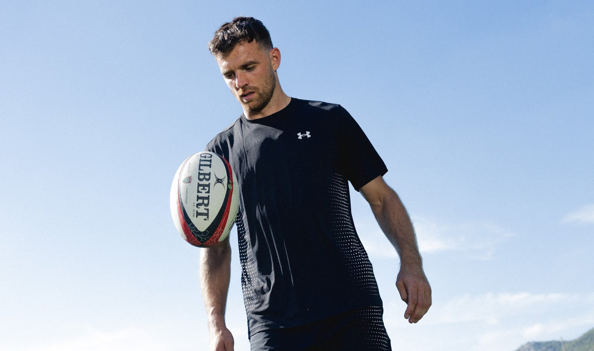 Ben White playing keepy-up with a rugby ball in training