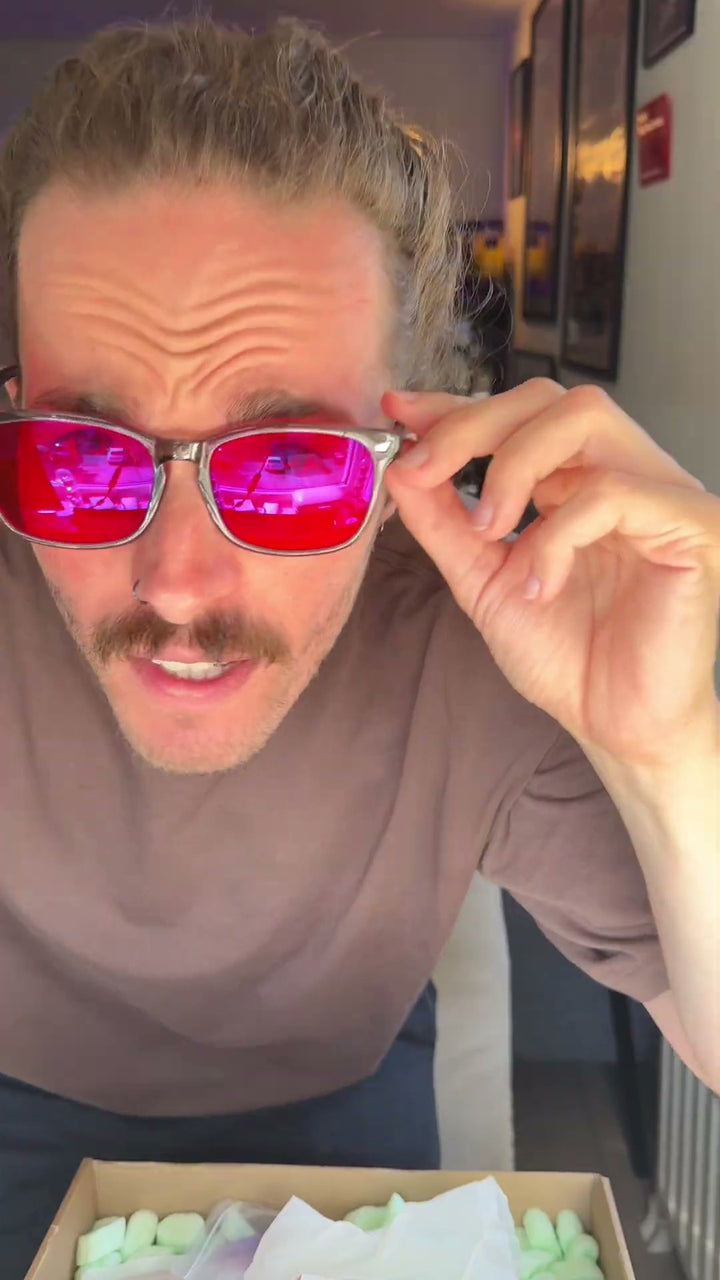 Customer trying on 8Hours blue blocking glasses