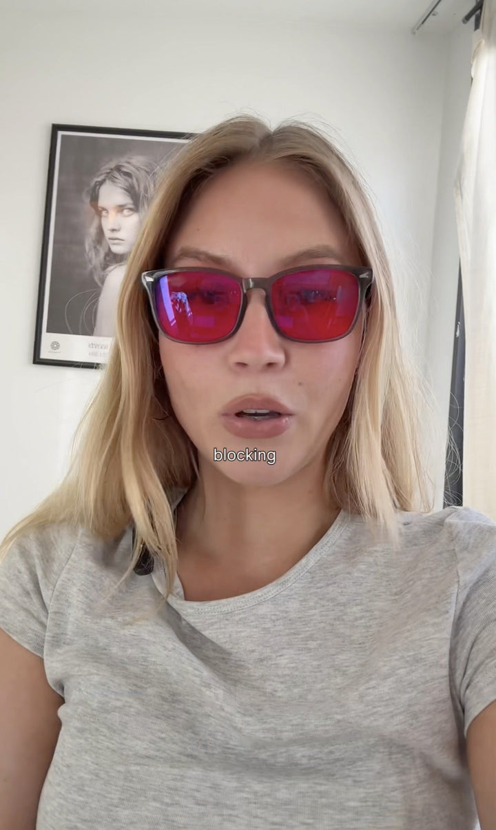 Customer wearing 8Hours blue blocking glasses at home