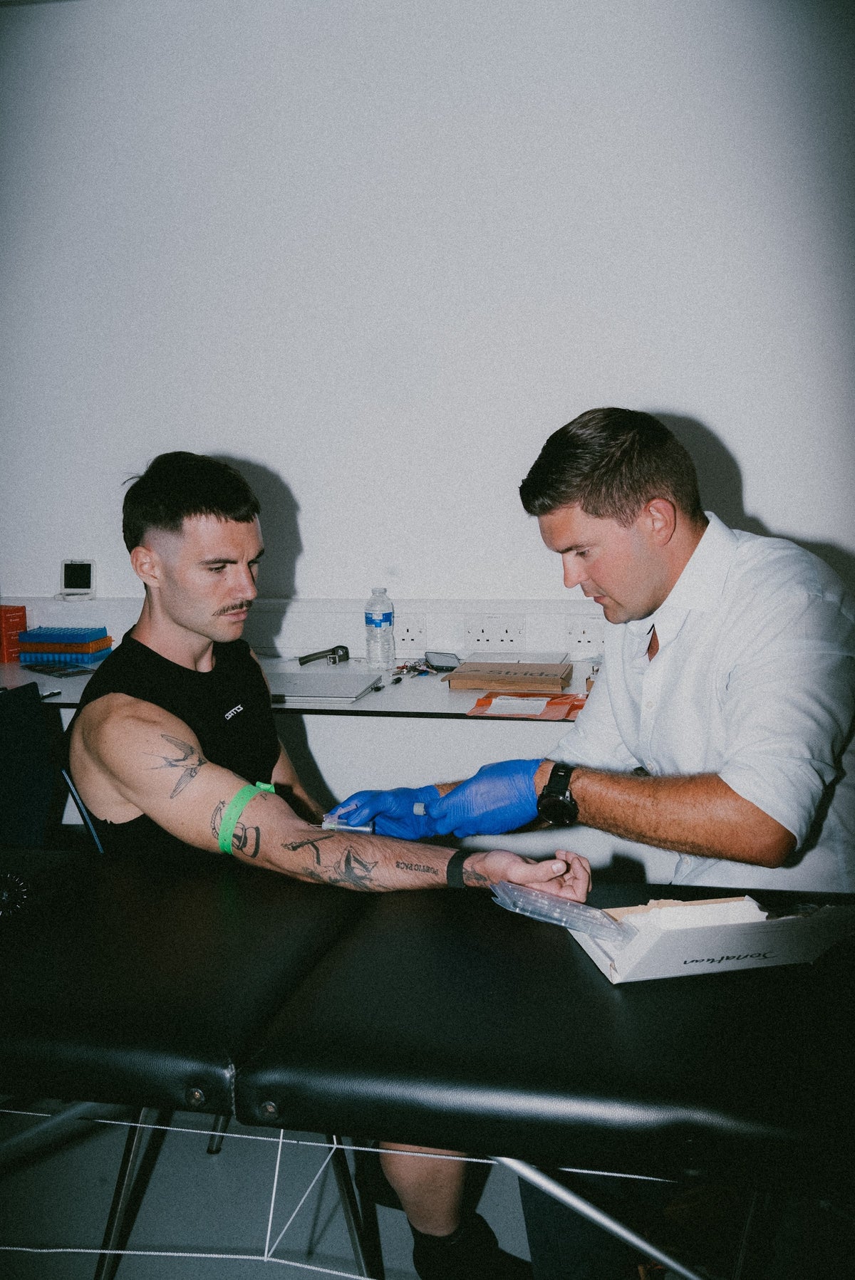An athlete being tested by a practitioner