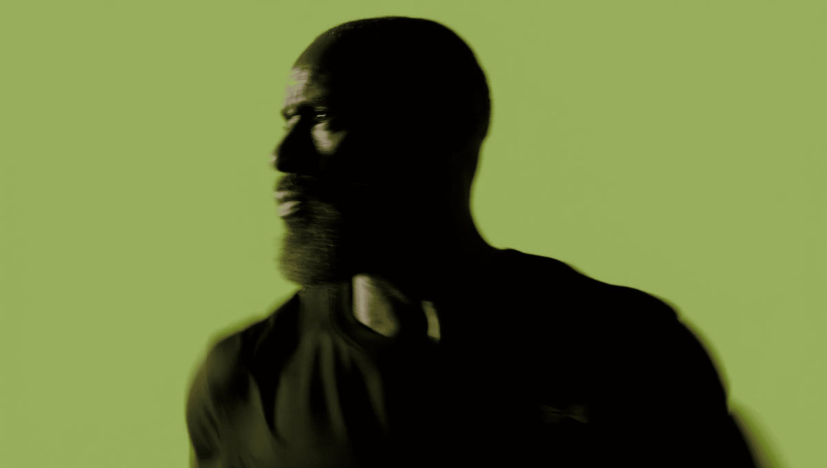 Athlete against a green backdrop
