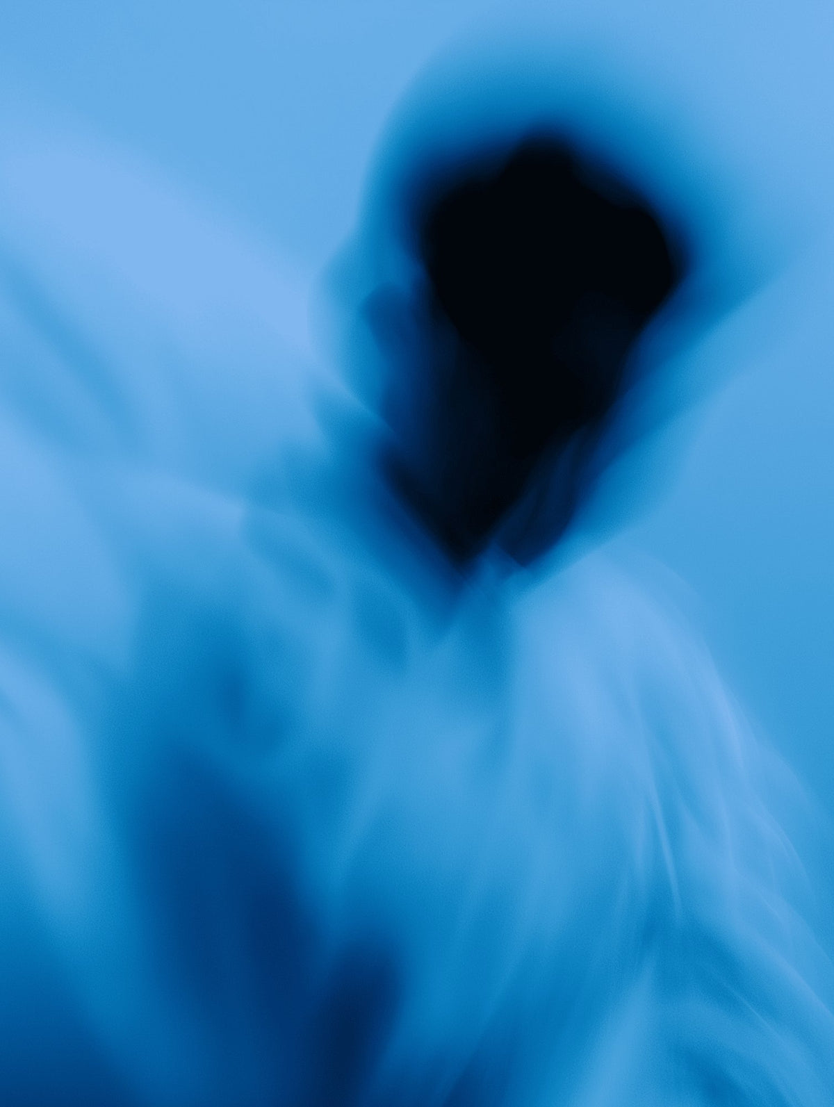 Blurred blue fabric in motion